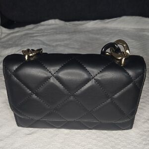 Chic Black Quilted Clutch with Gold Accents